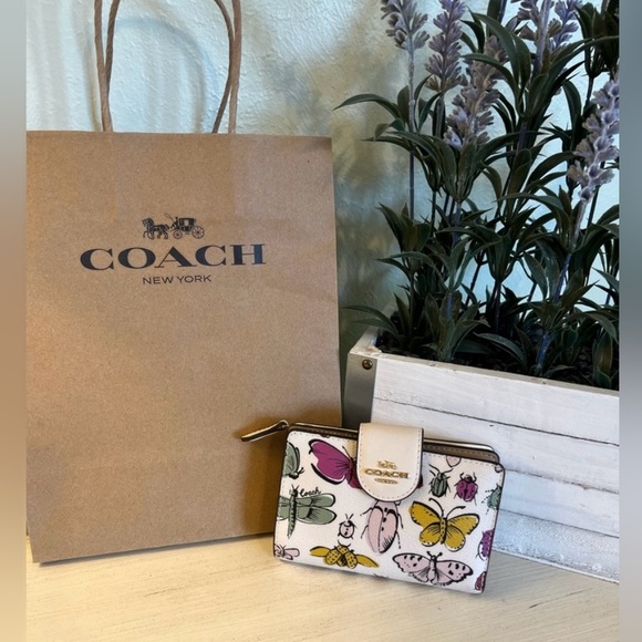 Coach Handbags - Coach Limited Edition Critter Creature Coated Canvas Wallet